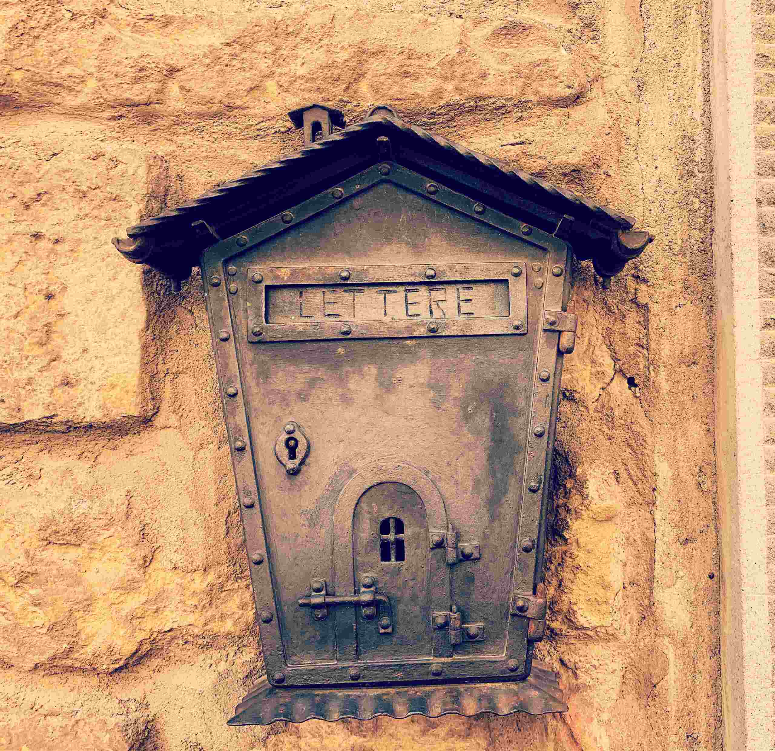 A Wooden Letter Box Fixed on the Wall
